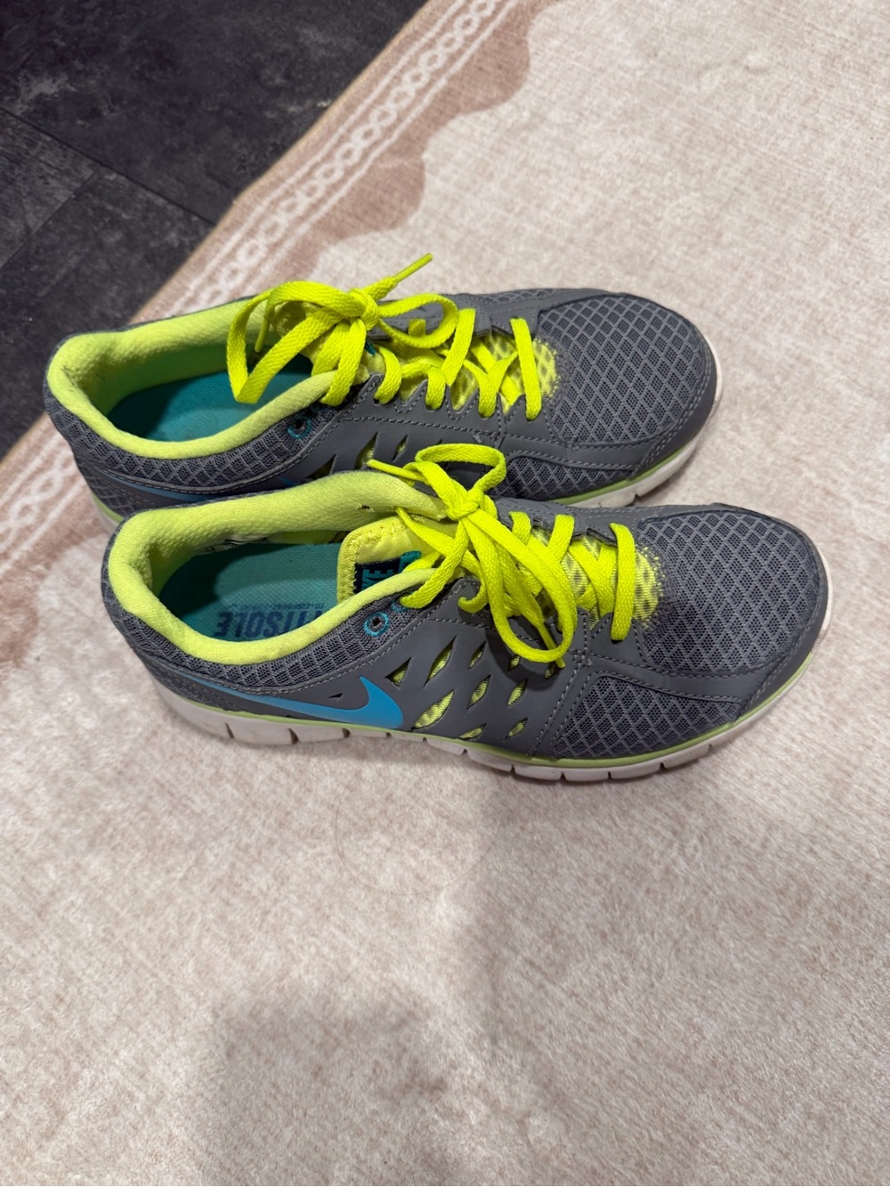 Nike women’s Gray Sneakers with Neon Yellow Laces